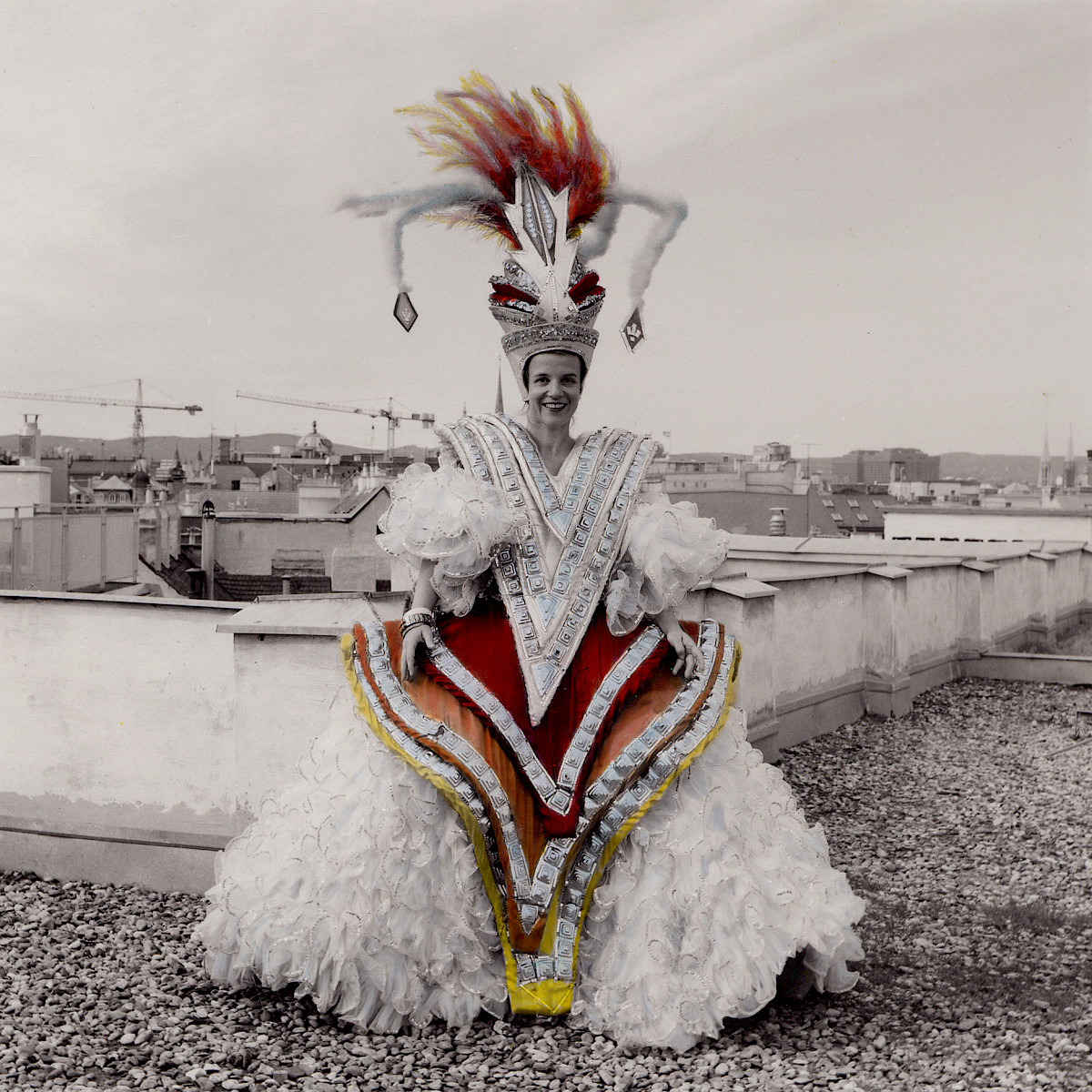 Lisl Ponger: The Brazilian. What tomorrow brings doesn’t matter. Christine Hochsteiner, taken in Vienna, 1st district; costume: Sambaschule Rot-Weiß-Rot (from the series <em>Xenographic Views</em>), 1995