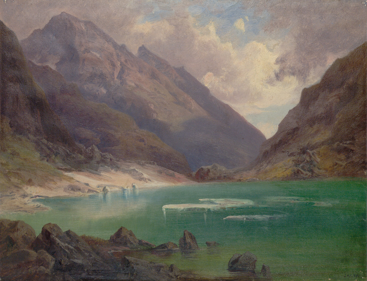 A green, turquoise mountain lake, framed by high mountains. In the sky, lots of clouds with a small blue stripe through which brighter light penetrates.