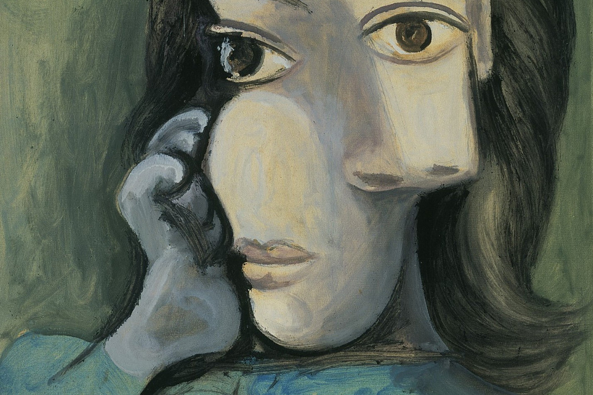 Oil painting: bust of a woman shown frontally, with simplified forms and strong color contrasts.
