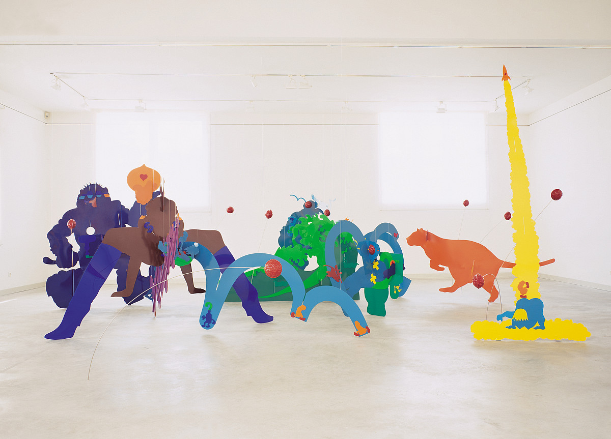 Sculpture of large colorful figures representing various animals.