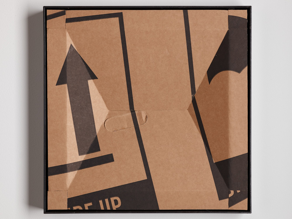 Square cardboard box with colorful print