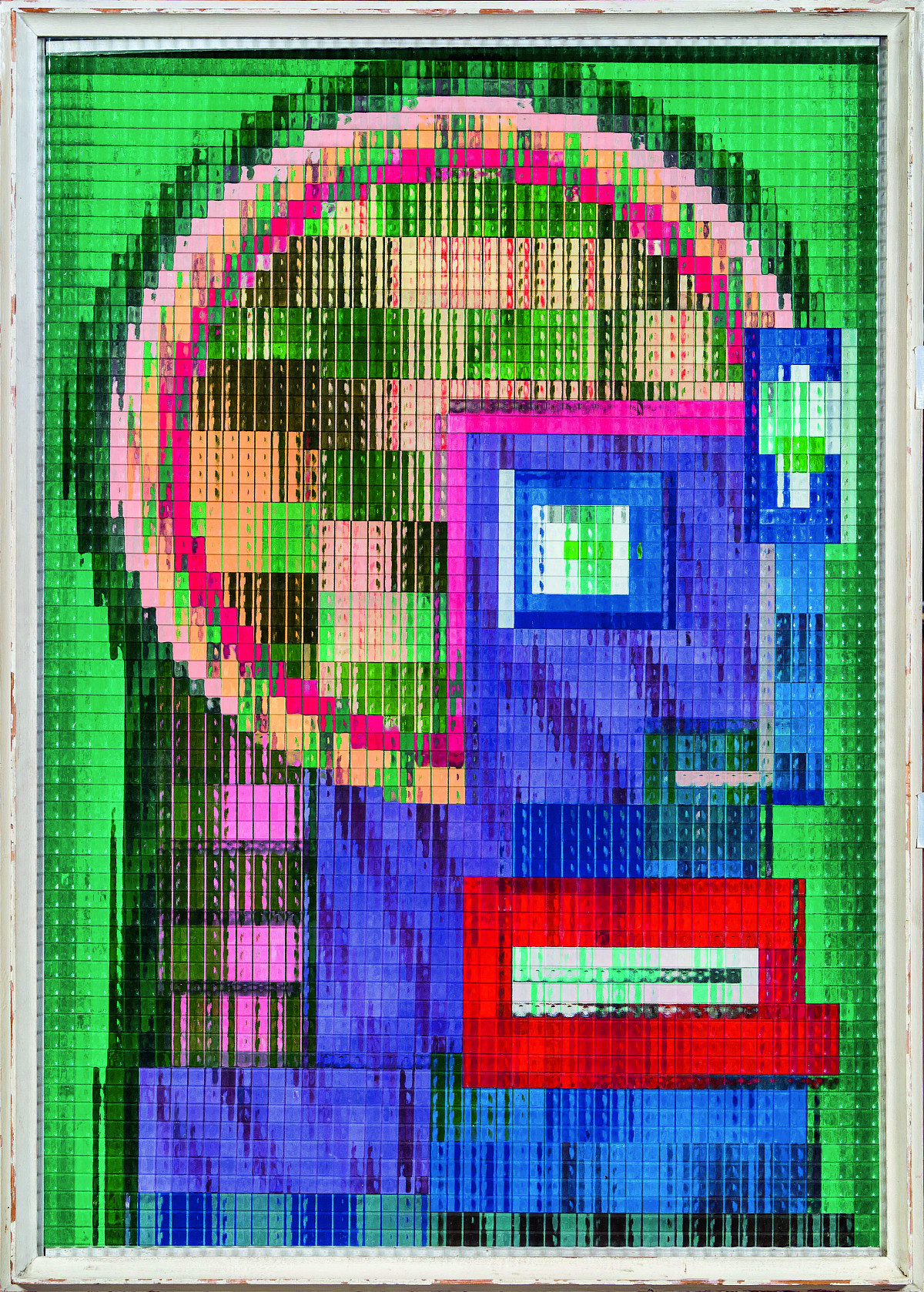 A portrait of a head composed of geometric shapes and various bright, bold colors behind transparent, textured glass.